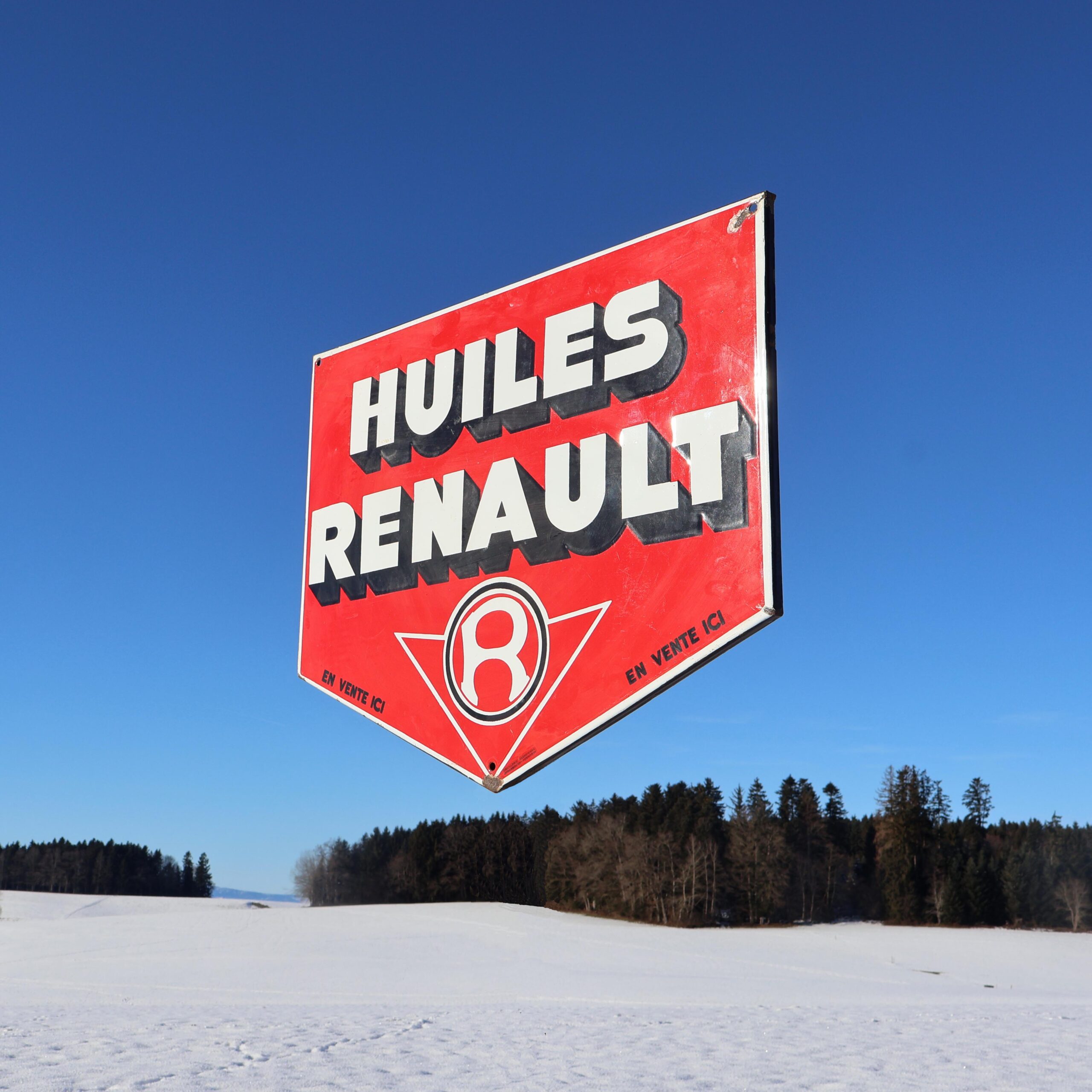 Huiles Renault plaque émaillée des années 1950.