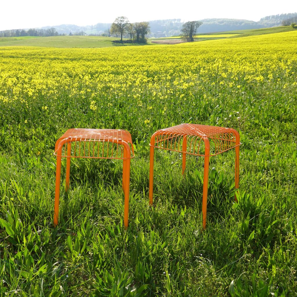 Vasteron orange stools IKEA. Design Inma Bermúdez
