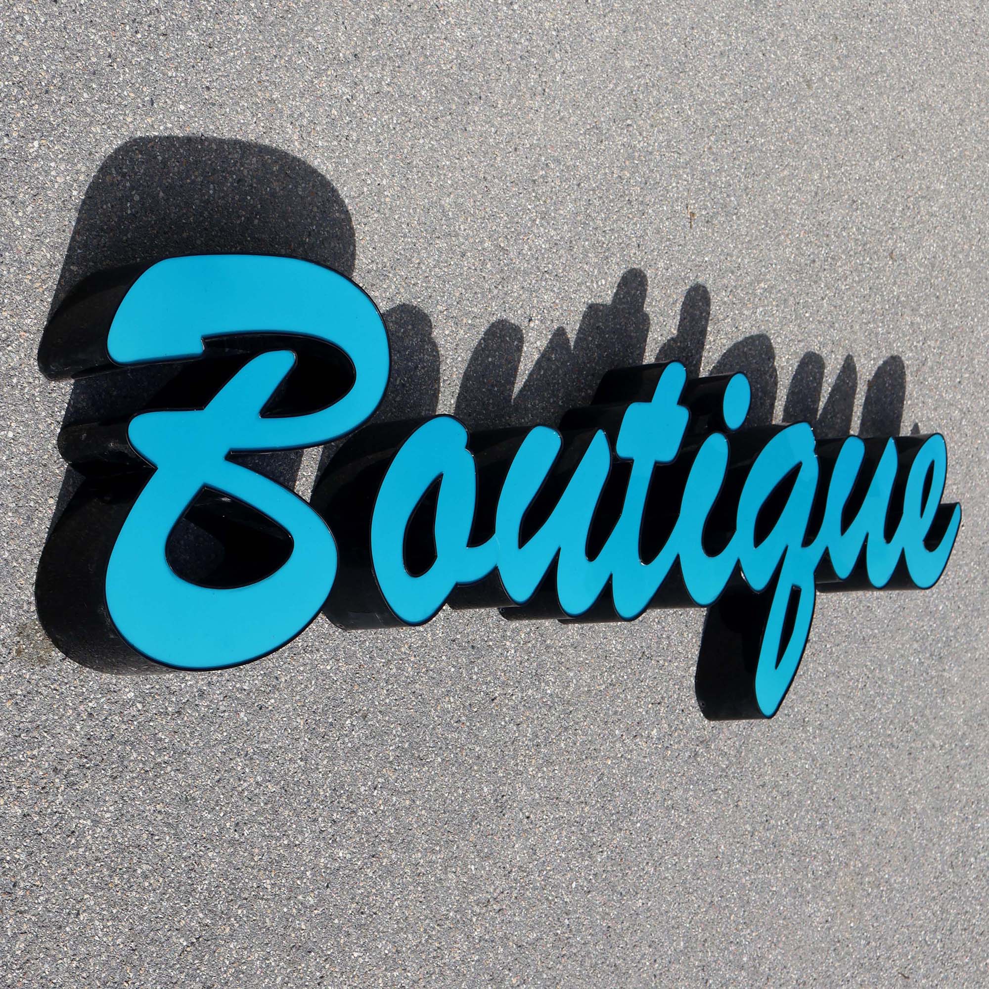 Enseigne lumineuse boutique 70s. Enseigne en relief 3D.